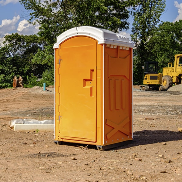 what is the cost difference between standard and deluxe portable restroom rentals in Hewlett